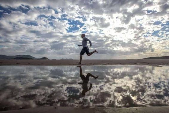 Man running on beach