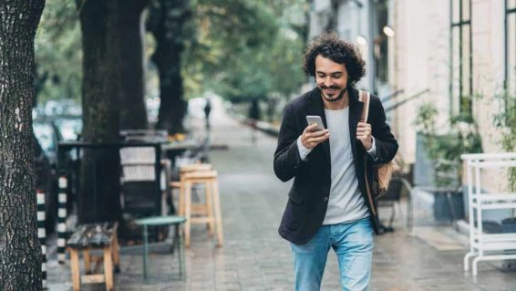 Man texting in the city